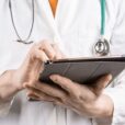 doctor with tablet 747x560