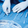 surgical nurse arranging surgical tools in operating room