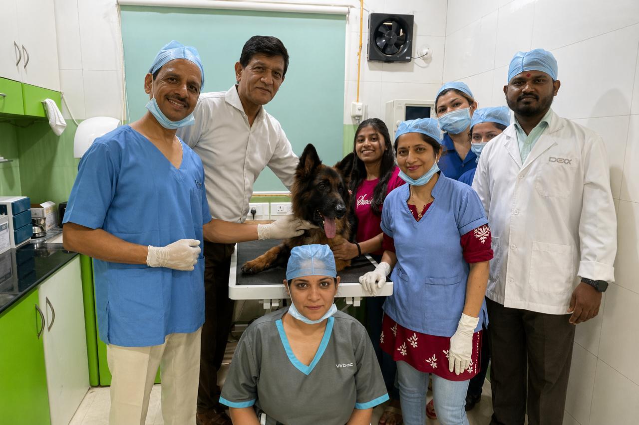 L to R Dr Narendra Paedeshi owner Mr Doodanwar Dhanashri Kulkarni sittingDod Shelby Tanuja Mungale Reena Haribhat Ankita Diwedi Technician Avinash