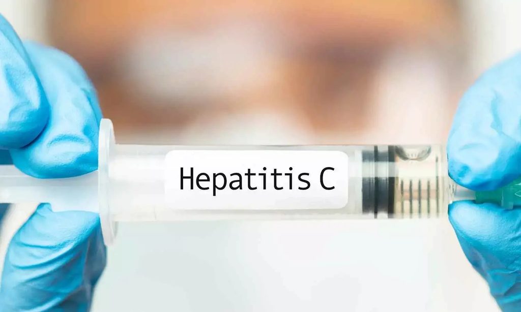 Hepatitis C Treatment study showing a blood sample in a test tube for hepatitis C research in India.